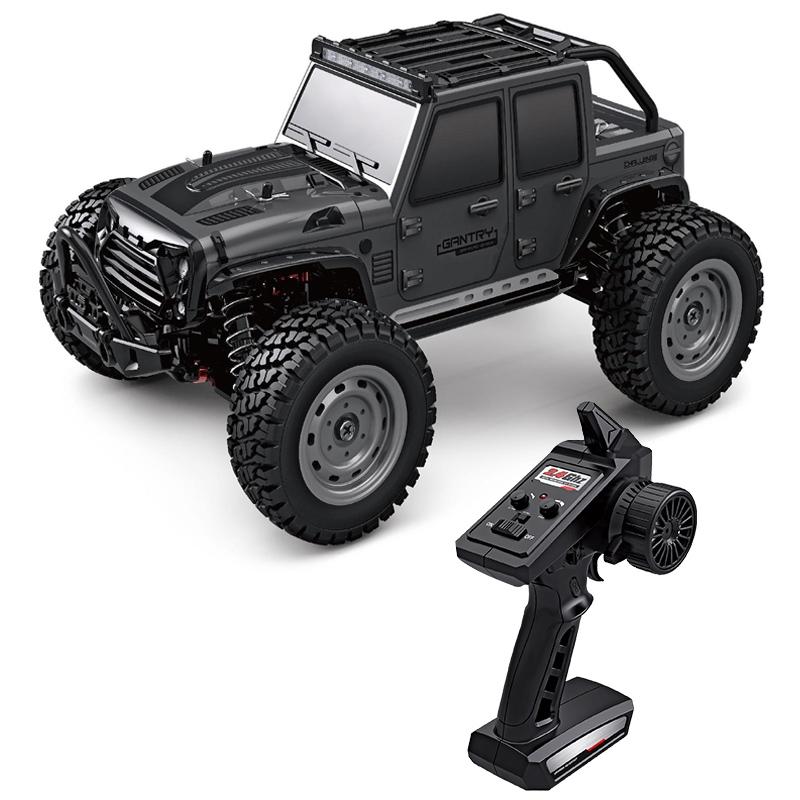 Black remote control off road ride on car for kids with large knobby tires and handheld transmitter