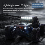ToyChest AU kids ride on car with 14 high brightness LED roof lights and round headlights on rocky terrain