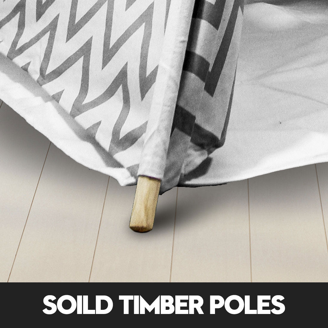 kids teepee tent Australia grey chevron fabric close up showing solid timber poles on pale wooden floor
