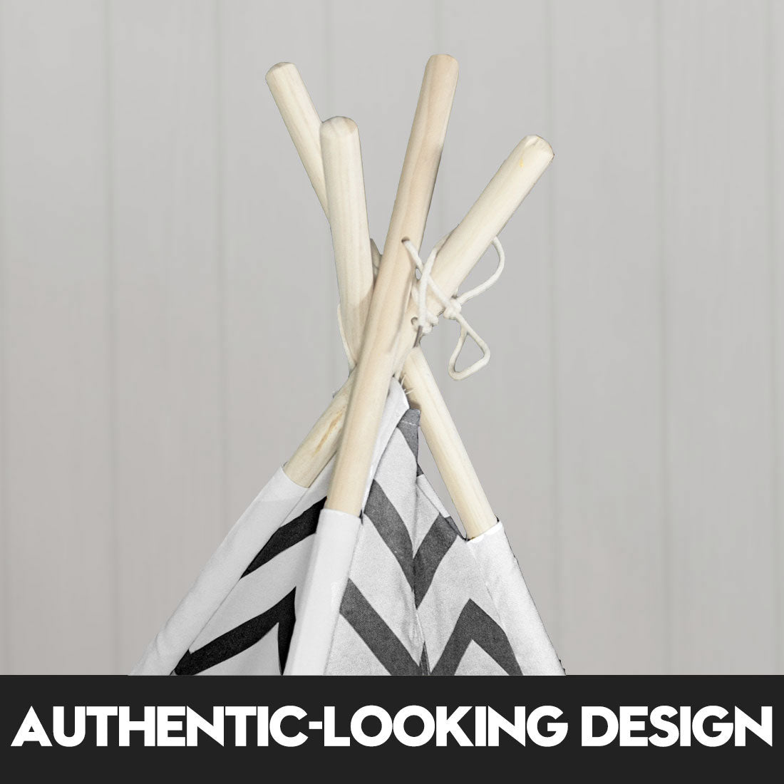 kids teepee tent Australia white and grey chevron fabric with natural wooden poles close up authentic design
