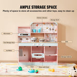 ToyChest au pink wooden kids kitchen playset Australia with microwave sink oven shelves utensils and toys on rug