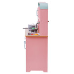 Pink wooden kids kitchen playset Australia side view with stove sink faucet pots pans and play food