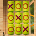 Green tic tac toe panel mounted on timber playset with orange slide handles wooden cubby house with slide Australia