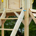 Close up of timber ladder and support beams on a playset wooden cubby house with slide Australia